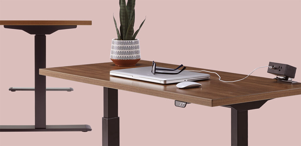 Laptop charging on smart desk