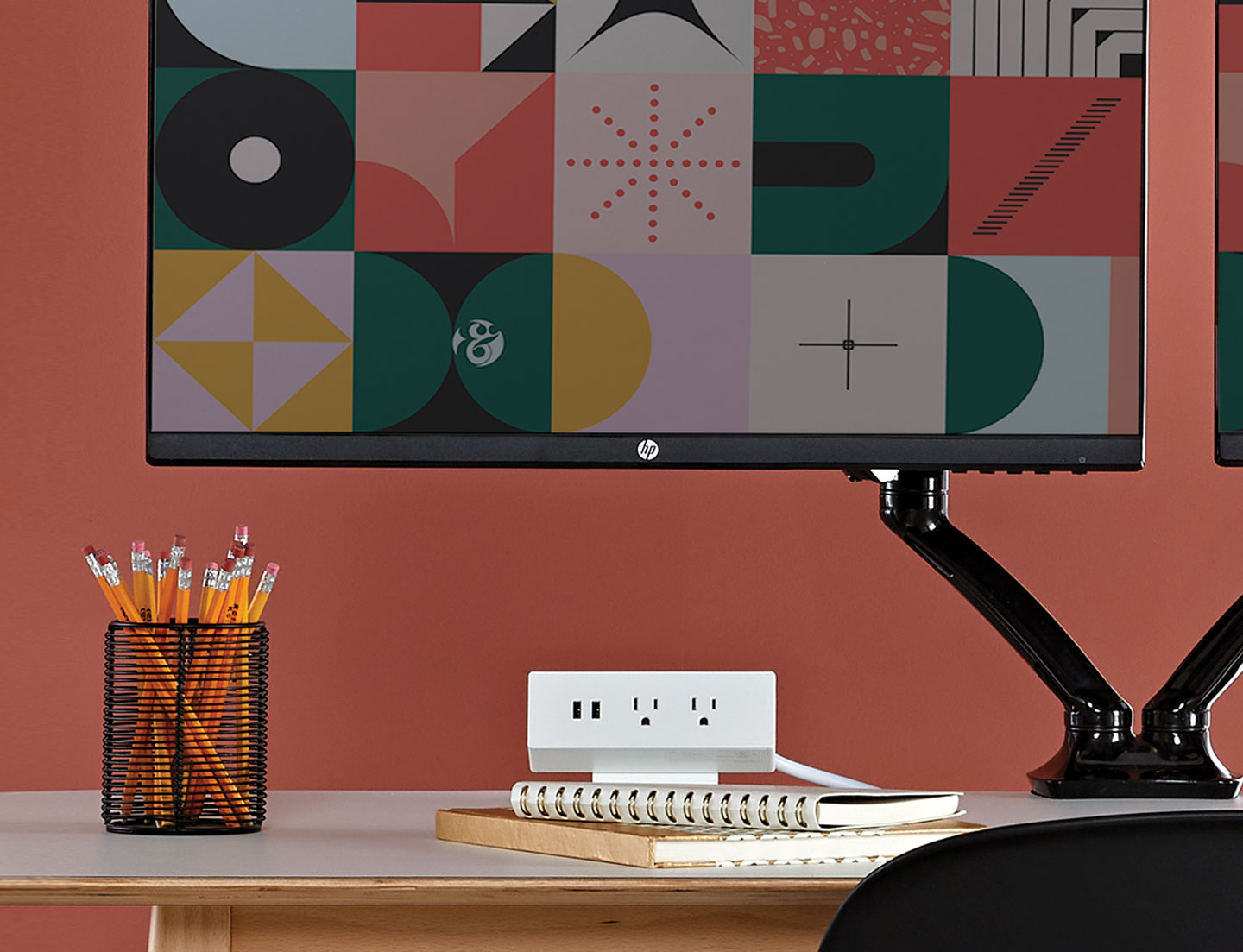 Computer desk equipped with usb and type b power plugs.